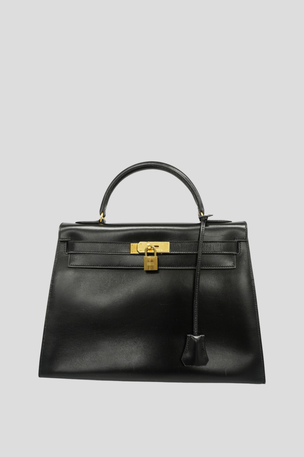 Black GHW Kelly Sellier 32 Box Calf Bag by Hermès