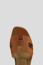 Load image into Gallery viewer, Gold Oran Sandal Size 37.5 / UK 4.5 by Hermès
