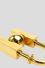 Load image into Gallery viewer, Gold L&#39;Homme Peut Embellir la Terre 2001 H Cadena Padlock Charm by Hermès
