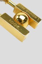 Load image into Gallery viewer, Gold L&#39;Homme Peut Embellir la Terre 2001 H Cadena Padlock Charm by Hermès
