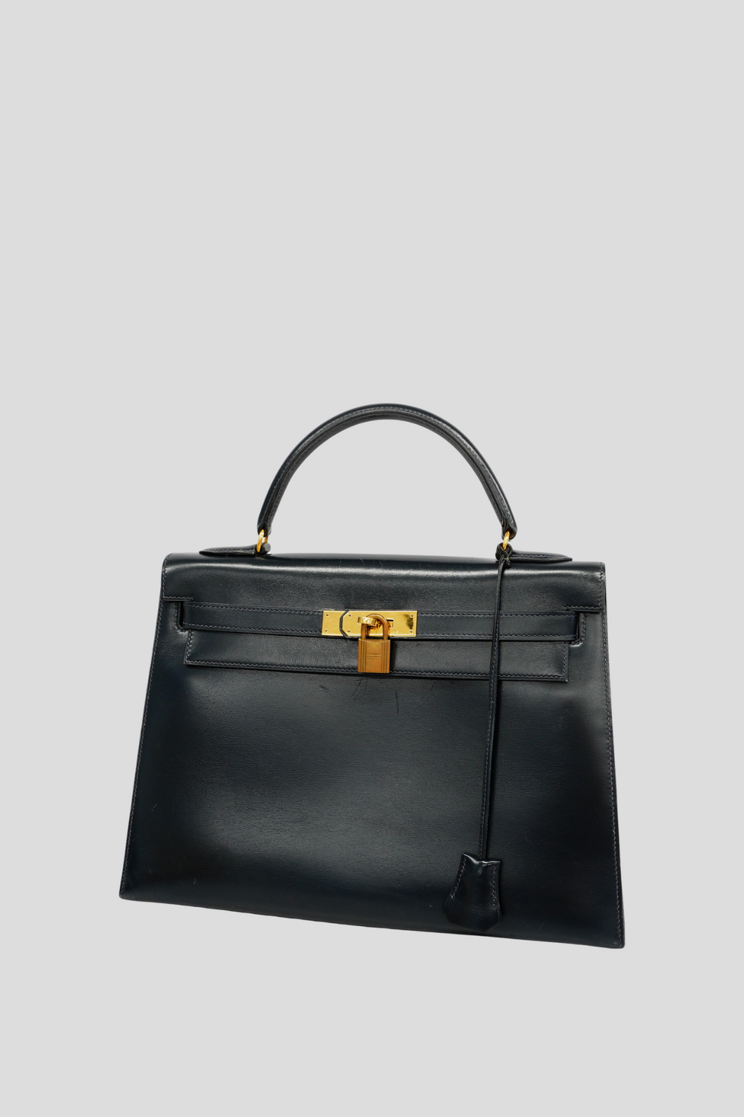 Black GHW Kelly Sellier 32 Box Calf Bag by Hermès