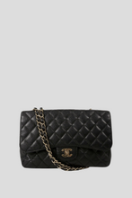 Load image into Gallery viewer, Black GHW Caviar Jumbo Single Flap Bag by Chanel
