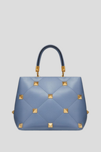 Load image into Gallery viewer, Blue Niagara Nappa Roman Stud The Handle Bag by Valentino
