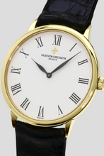 Load image into Gallery viewer, Black 18K Yellow Gold Patrimony Manual Winding Watch by Vacheron Constantin
