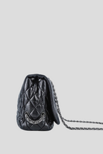 Load image into Gallery viewer, Black RHW Limited Edition Lambskin Paris Moscow Jumbo Flap Bag by Chanel
