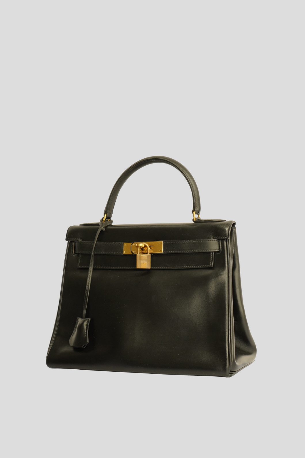 Black GHW Kelly Retourne 28 Box Calf Bag by Hermès