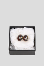 Load image into Gallery viewer, Amber CC Stud Earrings by Chanel
