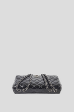 Load image into Gallery viewer, Black RHW Jumbo Single Flap Patent Leather Bag by Chanel
