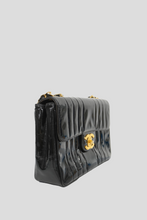 Load image into Gallery viewer, Black Jumbo Vertical Patent Leather Single Flap Bag by Chanel
