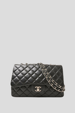 Load image into Gallery viewer, Black Lambskin PHW Classic Jumbo Double Flap Bag by Chanel
