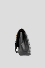 Load image into Gallery viewer, Black Caviar GHW Classic Maxi Double Flap Bag by Chanel
