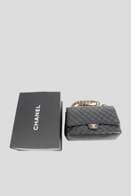 Load image into Gallery viewer, Black Caviar GHW Classic Maxi Double Flap Bag by Chanel
