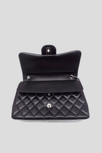 Load image into Gallery viewer, Black Lambskin Classic Jumbo Double Flap Bag by Chanel
