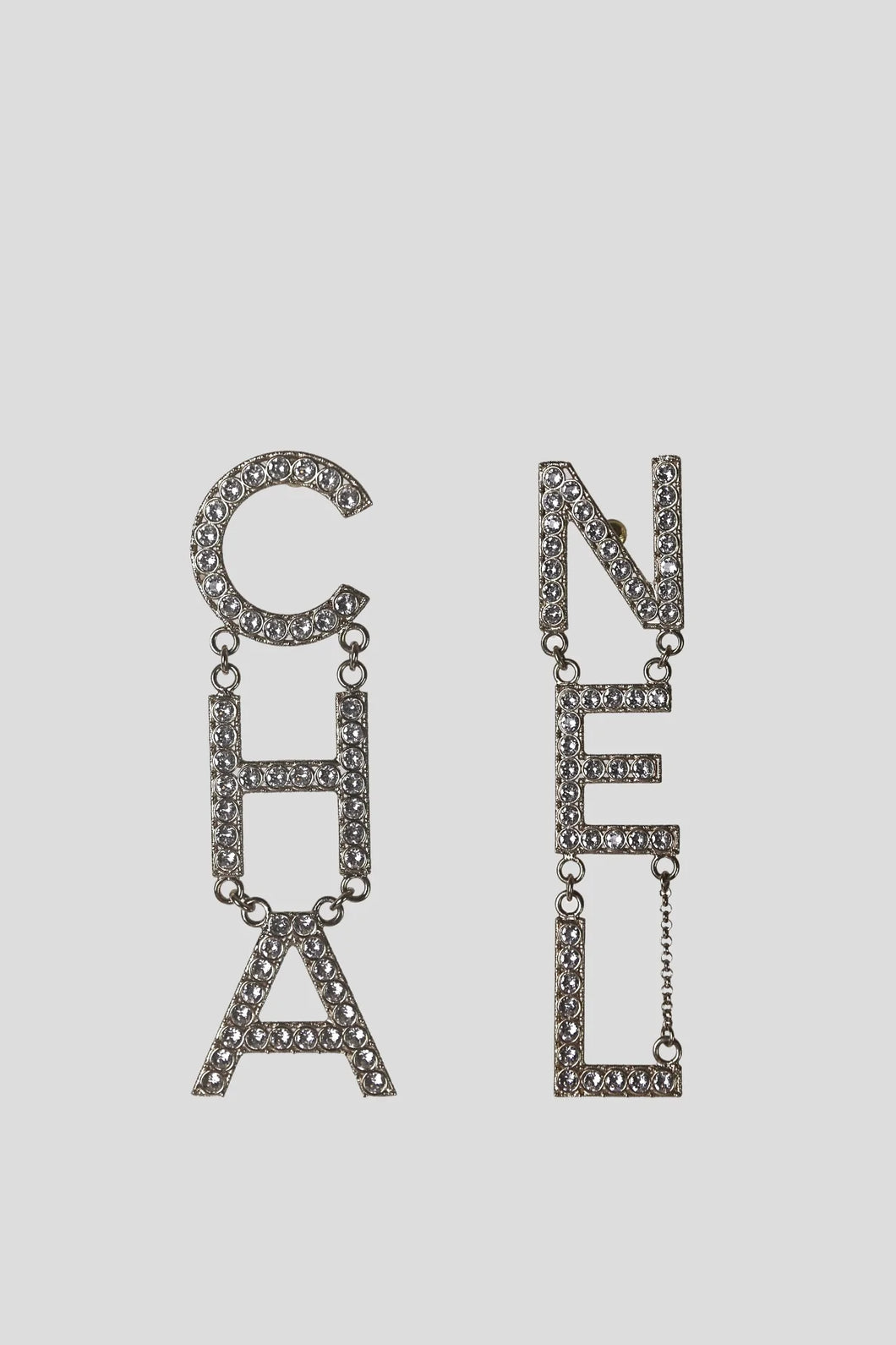 Gold Crystal CHA NEL Logo Earrings by Chanel